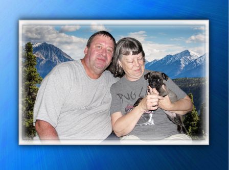 Paul & Malitta love their new girl Belle - Silver Pug Puppies | Petting, scratching, and cuddling a dog could be as soothing to the mind and heart as deep meditation and almost as good for the soul as prayer.