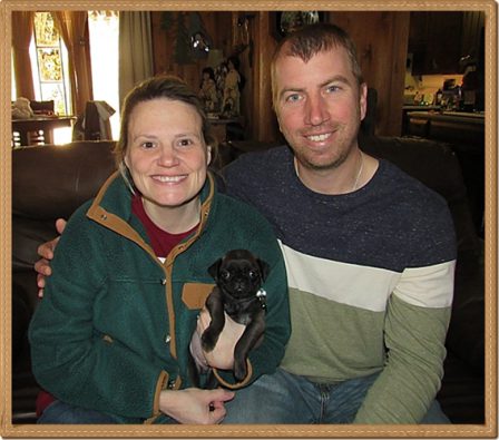 Stephanie & John with their 3rd BRP puppy Carlton, a rare chocolate! - Multiple Color Pugs Puppies | If dogs could talk, perhaps we would find it as hard to get along with them as we do with people.