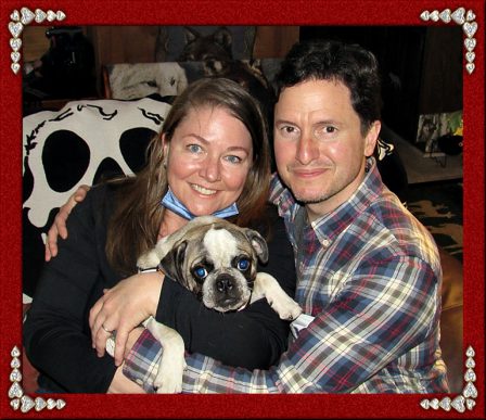 Lucy with her new mom Ame and dad Chris - Multiple Color Pugs Puppies | Petting, scratching, and cuddling a dog could be as soothing to the mind and heart as deep meditation and almost as good for the soul as prayer.